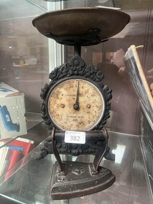Lot 382 - Black cast metal household scales along with a...