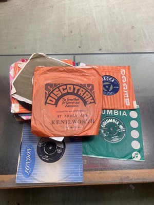 Lot 395 - An assortment of 45 RPM records by artists...