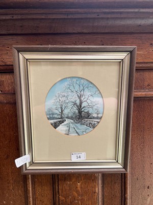 Lot 14 - A framed and glazed oil depicting a snowy path...