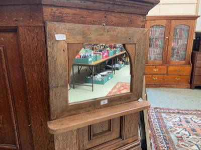 Lot 16 - A rustic stripped pine wall mirror with...