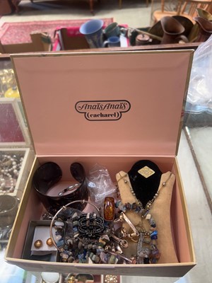 Lot 410 - A box containing assorted costume jewellery to...