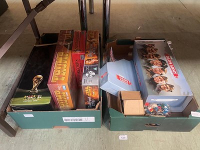 Lot 429 - Two trays containing assorted DVDs and...
