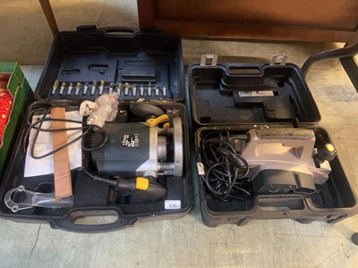 Lot 436 - A cased Powerbase electric planer along with a...