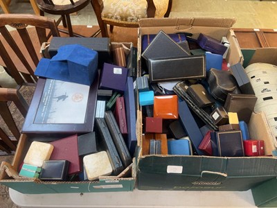 Lot 438 - Two trays containing a large quantity of empty...