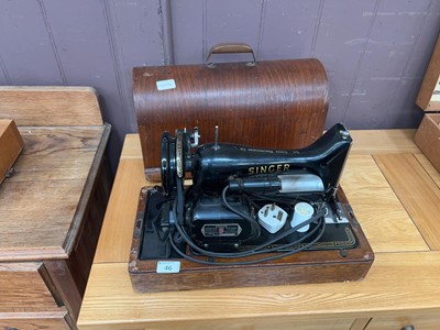 Lot 46 - A cased Singer electric sewing machine