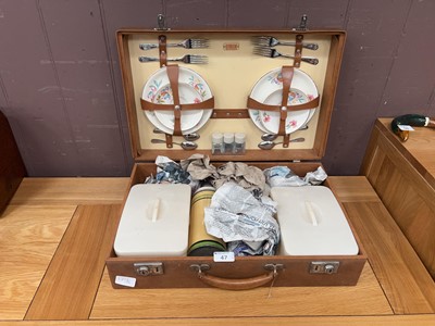 Lot 47 - A Sirram tan leather cased picnic set