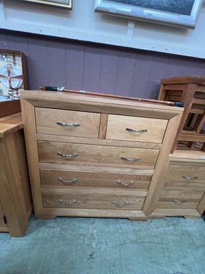 Lot 51 - A modern oak chest of two short over three...