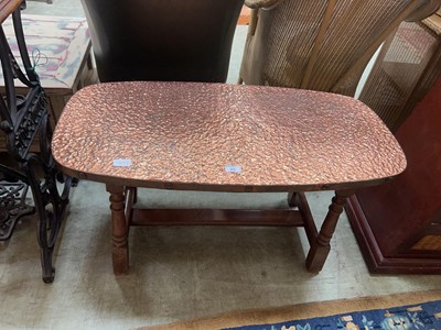 Lot 65 - An oak coffee table on turned supports with...
