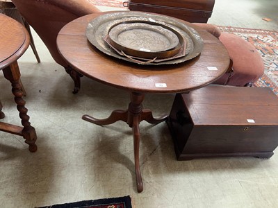 Lot 70 - A late Victorian oak tilt top tripod table on...