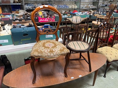 Lot 82 - A late Victorian carved mahogany balloon back...