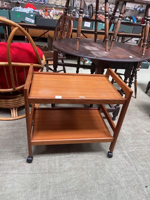 Lot 85 - A mid-20th century teak two tier trolley