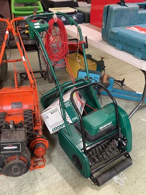 Lot 104 - A Qualcast garden scarifier along with boxed...