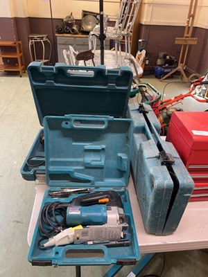 Lot 105 - Three cased Makita tools consisting of saw,...