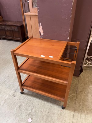 Lot 115 - A modern teak three tier trolley