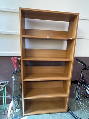 Lot 125 - A modern oak veneered full height bookcase