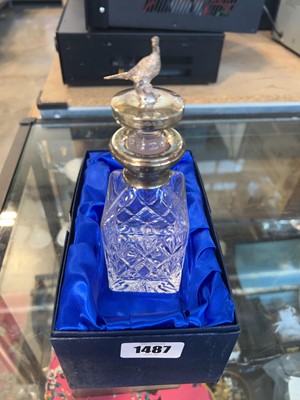 Lot 1487 - A small glass decanter bottle with hallmarked...
