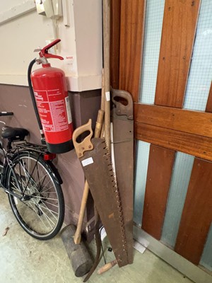 Lot 127 - An assortment of long handled tools to include...