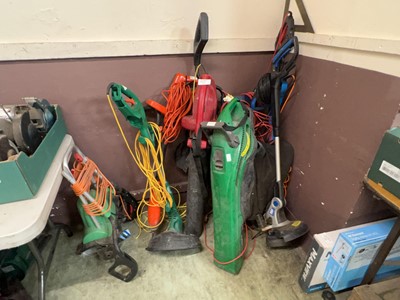 Lot 137 - An assortment of electric garden tools to...