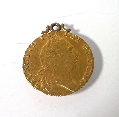 Lot 404 - A mounted George III gold 'Spade' Guinea dated...