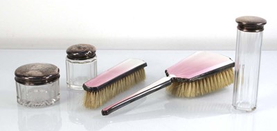 Lot 326 - Two silver and pale pink guilloche enamelled...