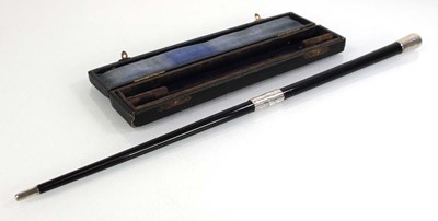 Lot 329 - A silver mounted two section conductors baton,...