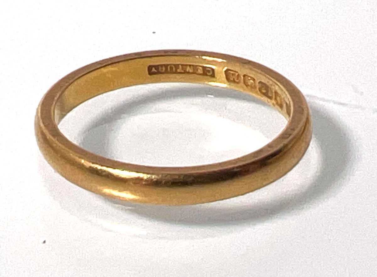 Lot 408 - A 22ct wedding band. Approx. weight 3.7g