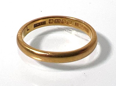 Lot 408 - A 22ct wedding band. Approx. weight 3.7g