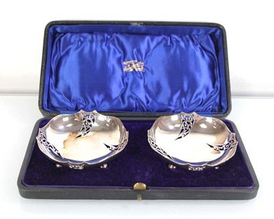 Lot 343 - A pair of silver dishes of circular form, each...