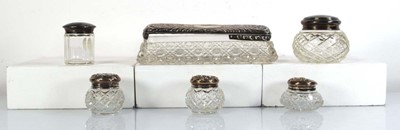 Lot 347 - Six silver lidded dressing table bottles,...