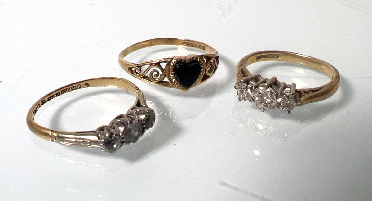 Lot 421 - A yellow metal and CZ ring marked '9ct plat'...
