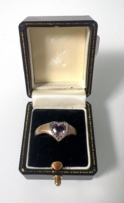 Lot 426 - A yellow and white metal heart shaped amethyst...