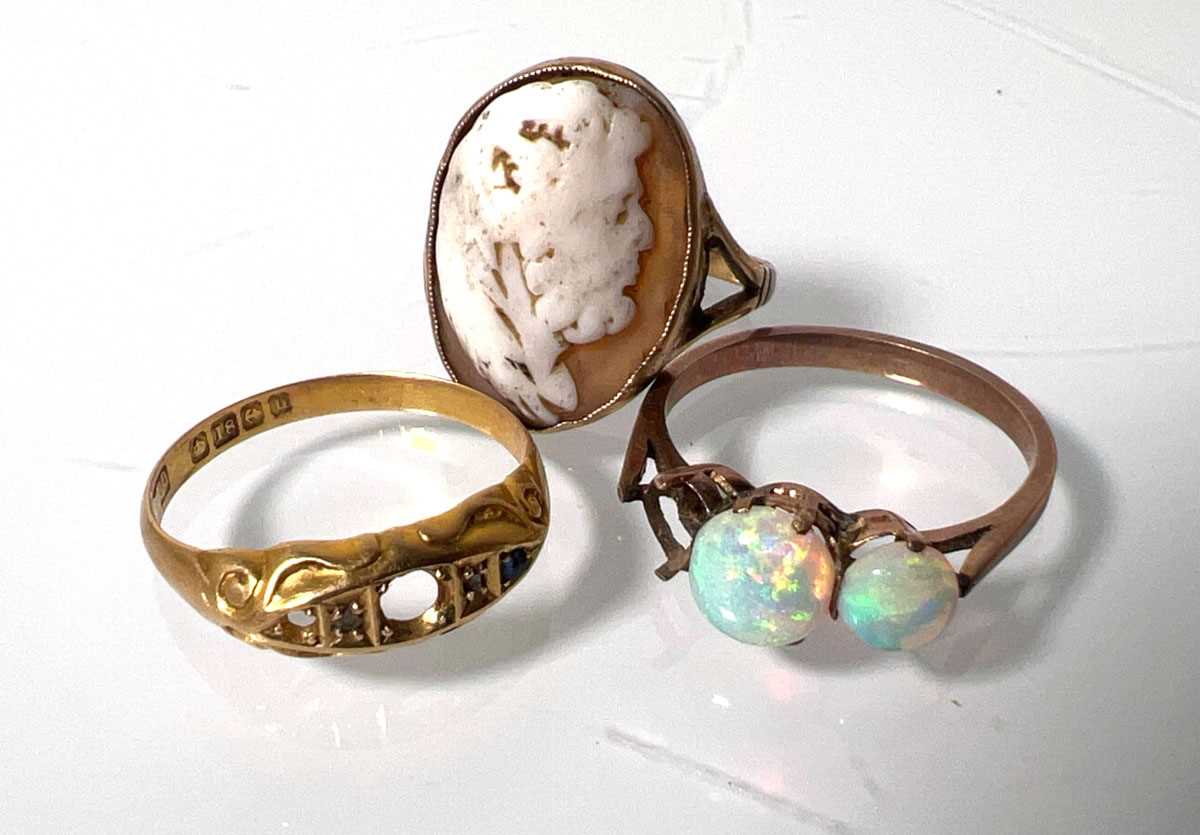 Lot 428 - An 18ct gold ring together with a yellow metal...
