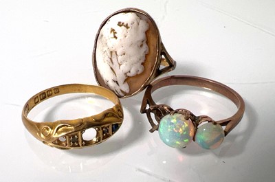 Lot 428 - An 18ct gold ring together with a yellow metal...