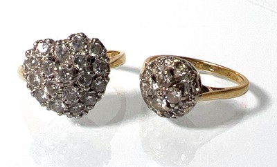 Lot 441 - An 18ct gold heart shaped diamond cluster ring...