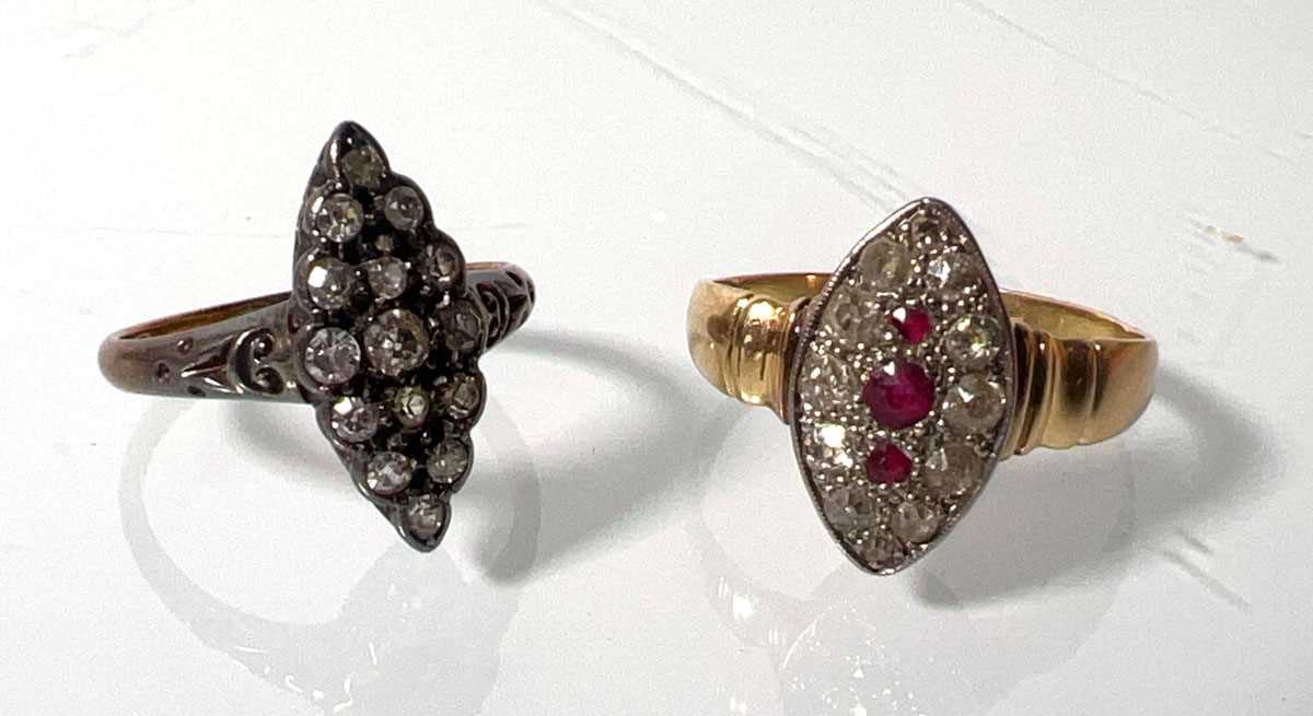 Lot 443 - A yellow metal, marquise shaped ruby and...