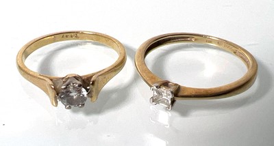 Lot 444 - A yellow metal and diamond solitaire ring...