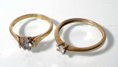 Lot 444 - A yellow metal and diamond solitaire ring...