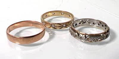 Lot 448 - Three yellow/white metal rings, one marked...