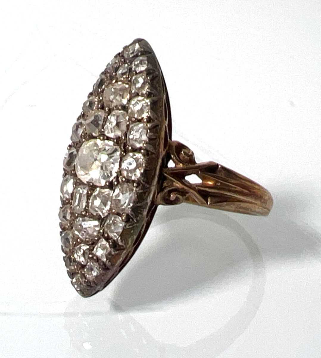 Lot 450 - A late 19th century marquise shaped yellow...