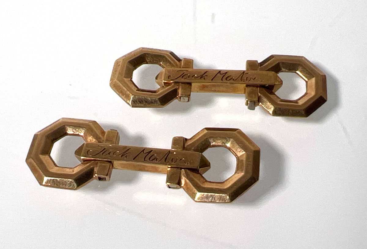 Lot 456 - A pair of yellow metal cufflinks marked '9ct'...