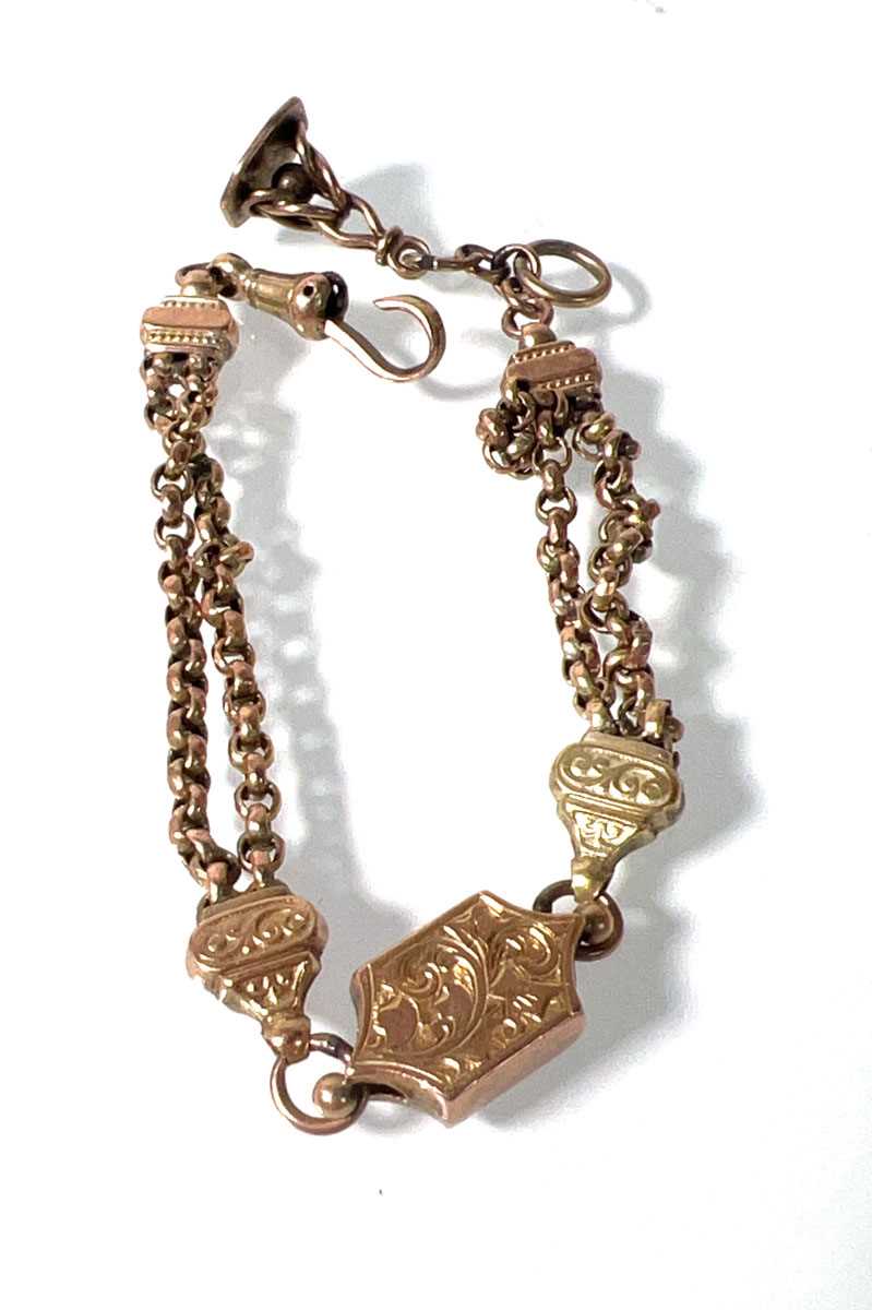 Lot 459 - A yellow metal albertina watch chain. Approx....