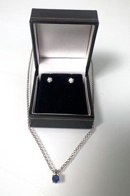 Lot 461 - A pair of platinum and diamond stud earrings...