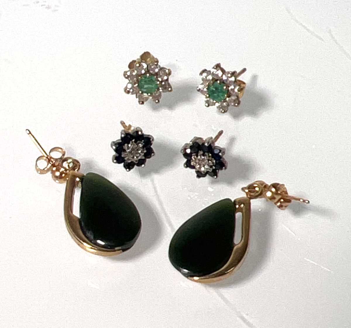 Lot 464 - Three pairs of 9ct gold/yellow metal earrings...