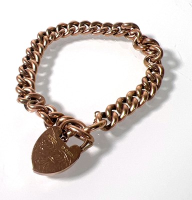 Lot 470 - A 9ct rose gold curb bracelet with heart...