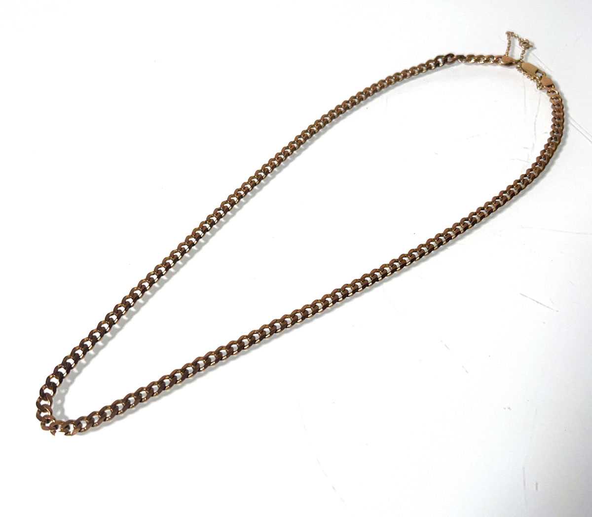Lot 477 - A 9ct rose gold curb link chain. Approx....