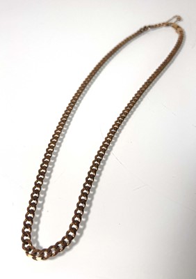Lot 477 - A 9ct rose gold curb link chain. Approx....