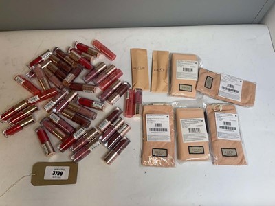 Lot 3799 - Large quantity of Revolution lip oils & Gucci...
