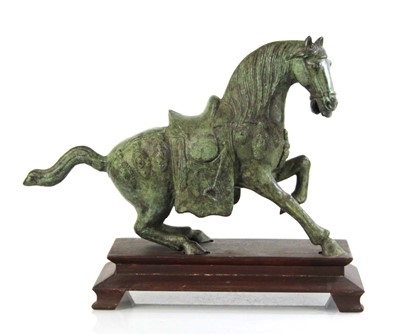 Lot 65 - A 20th century green-patinated bronze...