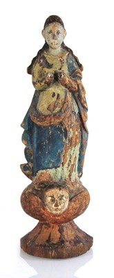Lot 67 - A polychrome wooden 'Santos' figure, h. 32 cm