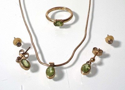 Lot 483 - A suite of 9ct gold and peridot jewellery...